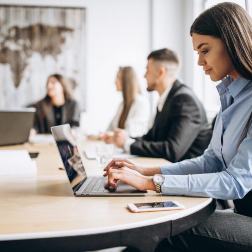 Group of people working out business plan in an office